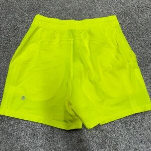 New without tags Pace Breaker yellow linerless 5” short